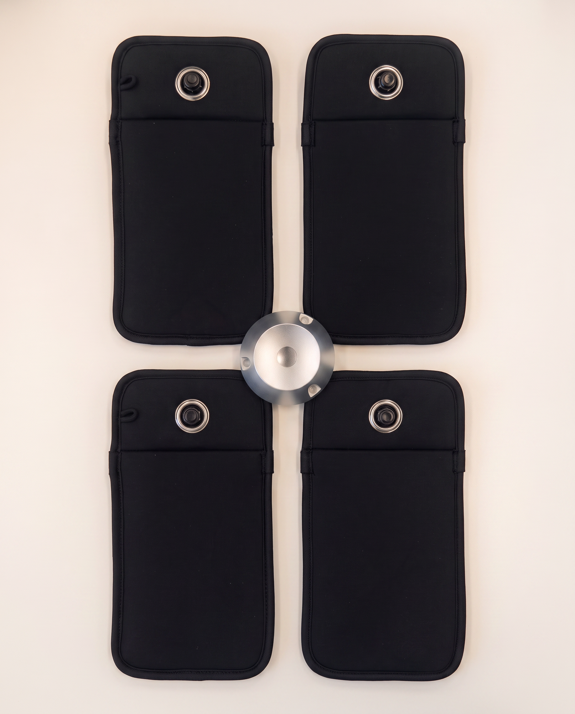Four TOVI pouches with an aluminium unlocker, a set prepared for a school.